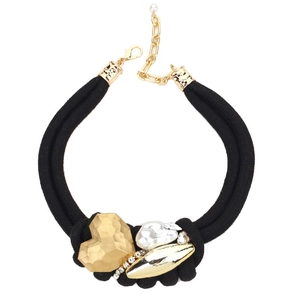 Double-layered black rope necklace featuring a large hammered gold heart and pearl pendant