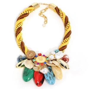 Bohemian statement necklace with shells pearls and colored charms on gold rope cord