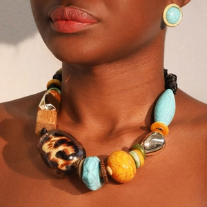 Bohemian jewelry set with turquoise, leopard print resin, and wooden beads necklace