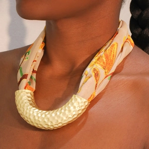 Bohemian U-shaped necklace with hammered gold pendant and floral leopard print silk band