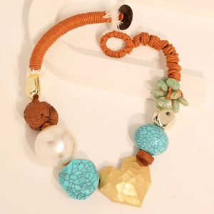 Bohemian wax rope necklace with matte gold heart pendant and turquoise beads