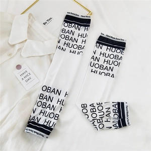 Close-up of cooling ice silk sun sleeves with black and white letter print design