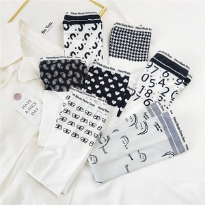 Breathable ice silk sun protection arm sleeves with stylish monochrome patterns