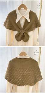 Detailed knit texture and hollow-out pattern of the grass green knit shawl for women