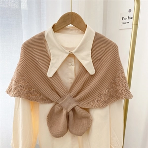 Khaki knitted shawl fake collar with wavy edges over a beige shirt for women