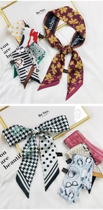 Détail de foulards en soie élégants montrant divers motifs floraux et à pois fins
