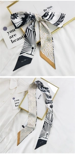 Détail d'un foulard en soie de style français avec motifs floraux noué en un nœud