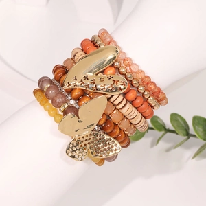 Lot de 9 bracelets bohèmes empilables avec perles en bois et pendentif papillon