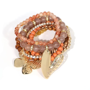 Set de bracelets bohèmes avec perles orange et breloques cœur et papillon dorées
