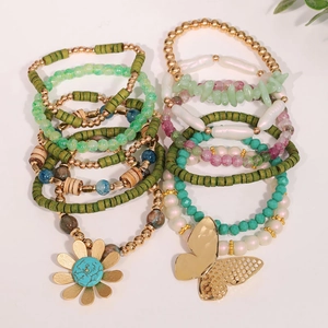 Bohemian multilayer stretch bracelet set with butterfly pendant and floral beads