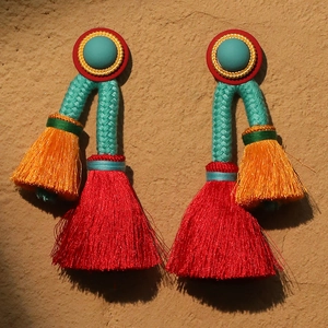 Bohemian multicolored tassel earrings with woven details and ethnic design elements