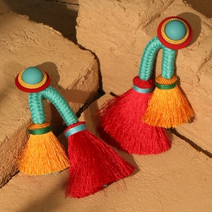 Bohemian long tassel earrings with turquoise studs and colorful woven cord accents