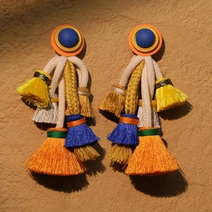 Bohemian colorful tassel earrings with blue matte top and vibrant woven threads