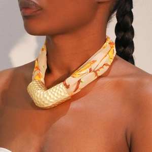 Bohemian silk scarf necklace with matte gold V-shape pendant and orange floral patterns