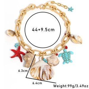 Starfish and shell necklace detail with length measurement and golden chain charms