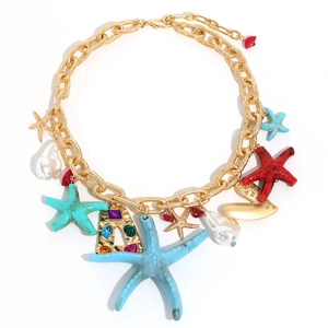 Summer ocean starfish and pearl pendant necklace with gold metal chain on white background