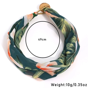 Detail view of floral fabric choker necklace with 49cm length and 10g weight details