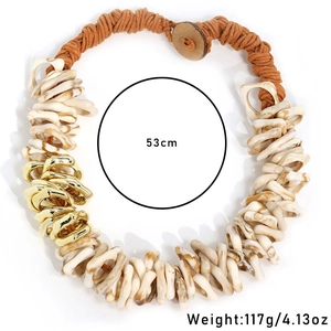 Detail view of woven hemp necklace with cream resin rings and gold accents, 53cm long