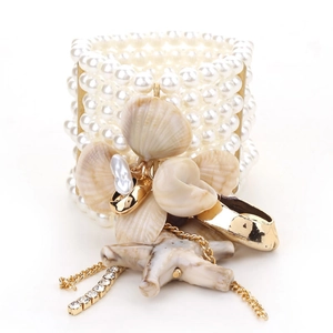 Elegant multi-layer pearl stretch bracelet with starfish and shell charms for beach vacation
