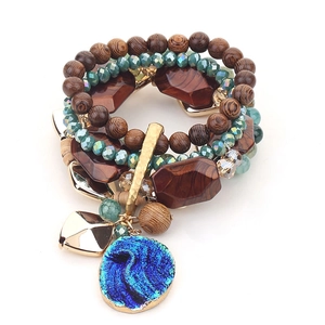 Bohemian multi-layer handmade beaded bracelet with blue stone pendant and earthy wood beads