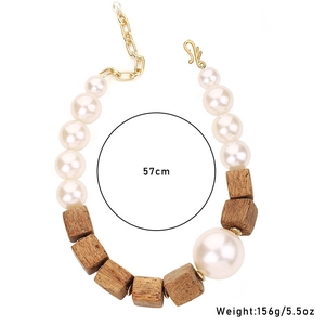 Close-up of beaded necklace with white pearls and brown wooden cubes, 57cm long