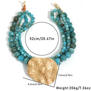 Detail of bohemian multilayer beaded necklace with size labels and weight specifications