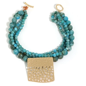 Detail of bohemian layered turquoise beaded necklace with gold textured square pendant