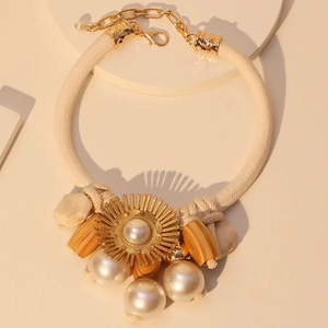 Elegant sun pendant necklace with imitation pearls and thick woven rope cord