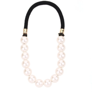 Elegant white faux pearl hair tie with black elastic band and gold metal hardware
