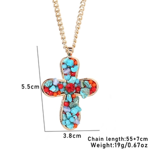 Detail of cross pendant necklace with colorful natural stone inlay and gold chain dimensions