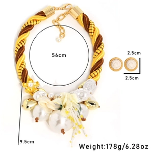 Detailed view of chunky floral necklace set with faux pearls and size specifications