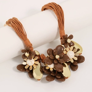 Handmade multi-layer cord necklace featuring 3D floral petals and golden metallic leaves