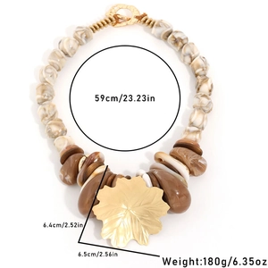 Bohemian beaded resin stone necklace with large gold leaf pendant and T-bar toggle clasp