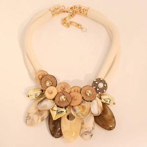 Handmade ethnic statement necklace with natural coconut shells and golden charms