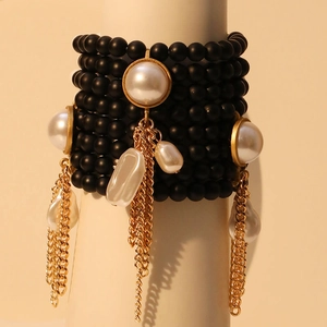 Bohemian black beaded multilayer wide cuff bracelet with white pearls and gold tassels