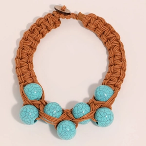 Handmade bohemian thick rope necklace featuring seven round turquoise stones and wooden toggle