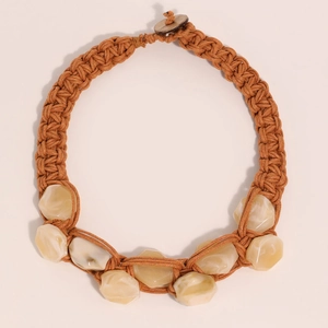 Handmade woven rope necklace with amber resin stones in minimalist bohemian style