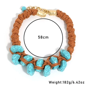 Close-up of handmade woven rope necklace featuring 58cm length and turquoise stone detail