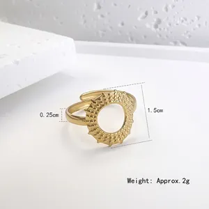 Adjustable golden sunflower ring in stainless steel with a hollow circular sunburst design