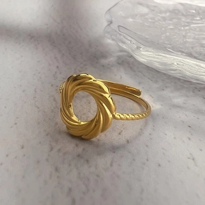 French style gold hollow open ring in minimalist twisted metal design for women