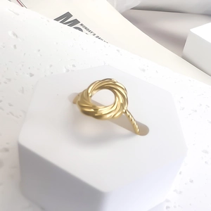 French style gold-plated stainless steel rope ring with hollow minimalist twist design