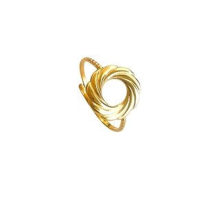 Minimalist gold-plated stainless steel hollow twist ring with polished finish