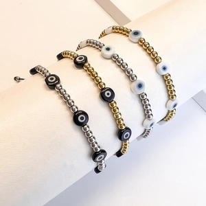 Set of 4 handmade evil eye beaded bracelets with gold and silver beads for men and women