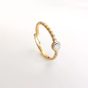 Gold plated beaded open ring featuring a sparkling central round zircon stone