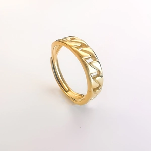 Detailed close-up of 18K gold plated chain link ring with polished finish and open design
