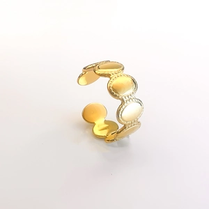 Detailed view of the vintage gold stainless steel ring with beaded texture and adjustable band