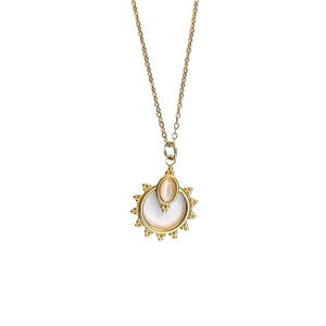 Golden sunburst pendant necklace featuring pink cat eye and shell inlay on thin link chain