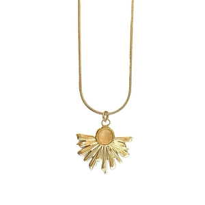 Golden stainless steel sunburst necklace with round moonstone pendant on snake chain