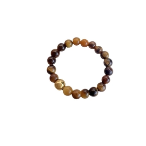Vintage tiger eye stone beaded elastic ring with a gold stainless steel accent bead