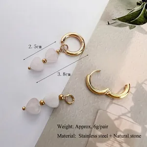 Gold stainless steel earrings with light pink heart-shaped natural stone pendants
